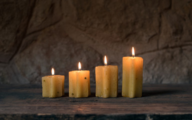 Christmas atmosphere with biscuits and pine cone on rustic background