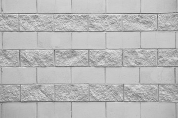 Stony wall background - texture pattern for continuous replicate. Seamless texture, background, stone lined with granite walls. Sandstone. stone wall backdrop. Facing stone