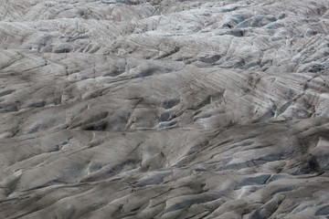 details of glacier Aletsch surface with crevasses