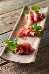 Jamon serrano with parsley .