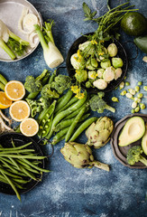 Greenery concept vegetarian vegan detox food table ingredients variety veggies 