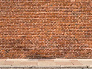 Poster Mur de briques Red brick wall with sidewalk