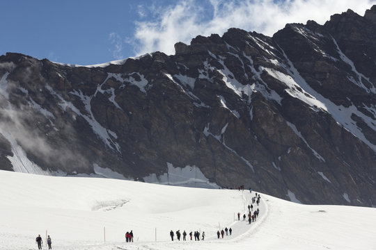 Hiking on Aletsch glacier from Jungfraujoch, the highest railway station in the Alps ,Berner Oberland, Switzerland