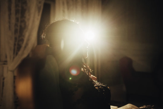 woman  with  theatrical mask and handsome man