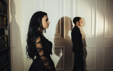 woman  with  theatrical mask and handsome man