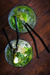 Two Mojito cocktails in glasses