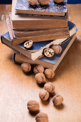 walnuts on old book