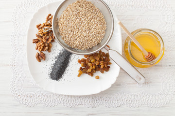 Ingredients for Christmas porridge on white table