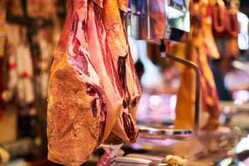 Jamon serrano ham in market Barcelona Spain