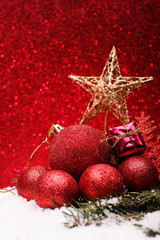 Christmas composition of Christmas tree toys on a red background