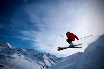 Freeride skier jumping  - obrazy, fototapety, plakaty