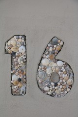House number 16 at wall in Australia