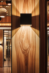 Design lamp on a wooden wall