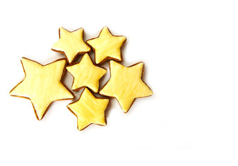Ginger tasty gingerbread in the form of asterisks, isolated on white background. Holiday gift