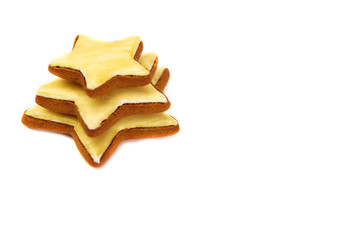 Ginger tasty gingerbread in the form of asterisks, isolated on white background. Holiday gift
