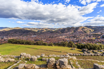 Fototapeta na wymiar Incan ruins, Cuzco city in the valley and Andes panorama, Peru