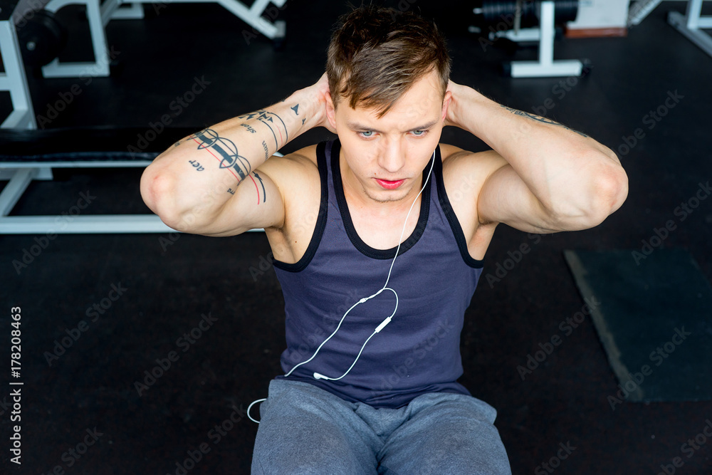 Poster man at a gym