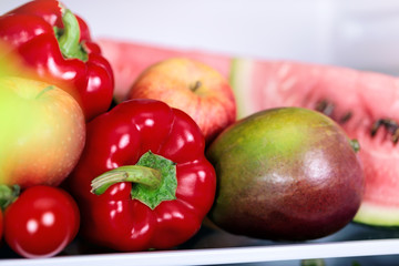 Naklejka na ściany i meble Colorful vibrant fresh vegetables ib refrigerator