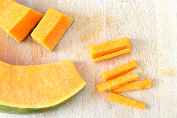 Background with pumpkin, ready to cook, from above