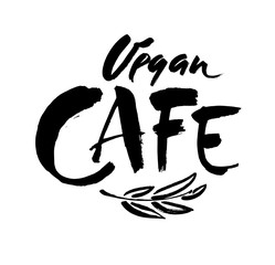 Vegan hand written calligraphy lettering with leaf for cafe menu design. Brush lettering Vector illustration.