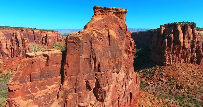 Dramatic Red Butte Against Blue Sky - Colorado National Monument