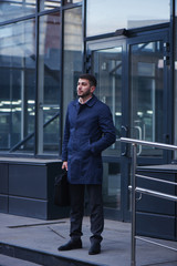 Portrait of businessman on the street