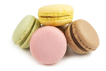 french sweet macarons  in pink, yellow, green and brown