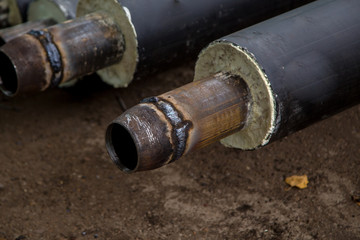 closeup of a heating pipe with welded adapter for the other pipe diameters
