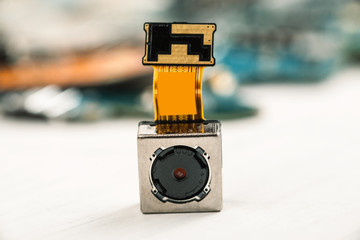 Smartphone camera module on a white background, closeup