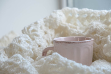 Cozy winter still life: opened book. Warm and comfy autumn or winter concept.