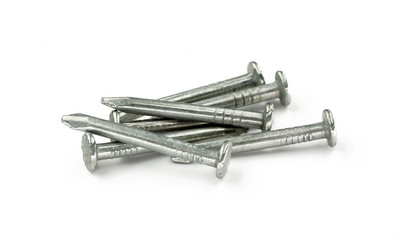 pile of metal nails on a white background