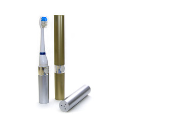 Two electric toothbrush isolated on white background