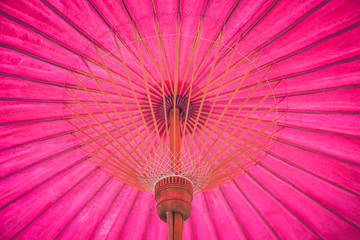 pink paper bamboo wood umbrella traditional northern Thai style handmade