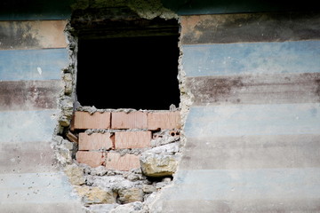 Broken window, bricks