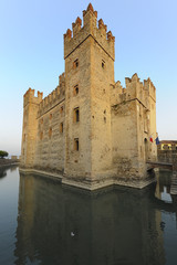 Obraz premium Scaliger castle - the 13th century fortress in Sirmione, Lake Garda,Italy