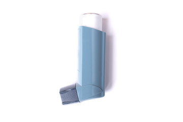 Asthma inhaler isolated on white background