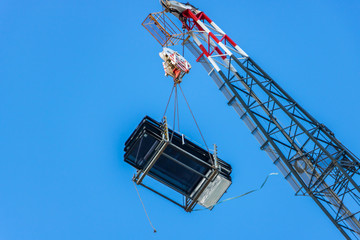 Crane Carrying Glass Pannels