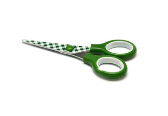 Children scissors on white background