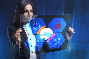The concept of business, technology, the Internet and the network. A young entrepreneur working on a virtual screen of the future and sees the inscription: Data protection