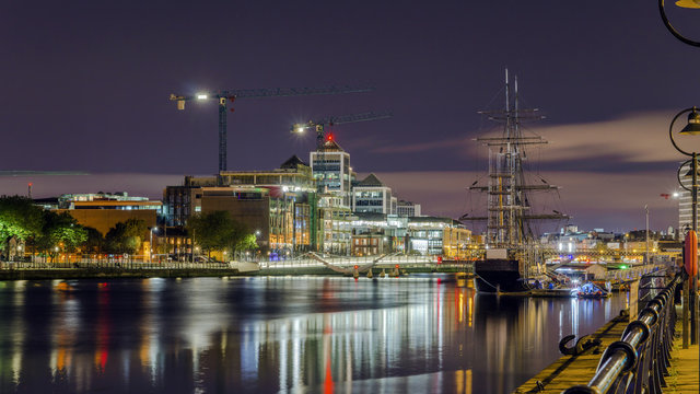 Dublin, Republic of Ireland, night view of The Custom House, Tall Ships, Sean O'Casey Bridge over the River Liffey