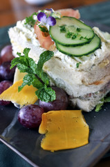 Close up Shot of a Gourmet Fruit and Sandwich Platter