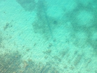 aerial view of sea edge with rocky beach 