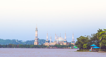 the view of beautiful mosque by the river