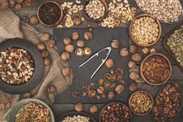 various nuts on wooden table top