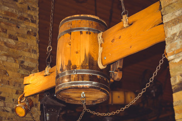 Beer on the ceiling. Handmade crafts made of wood, skill craftsmen in wood.