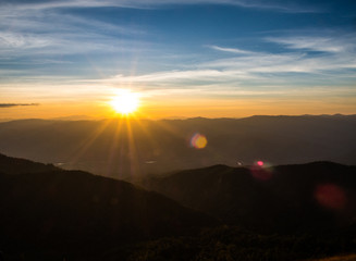 Big flare on the top of the shadow mountain at Mon Jong, Chiangmai, Thailand.