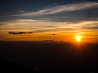The orange sunsetting with the gradient color line of sky in Chiangmai, Thailand.