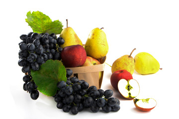 Naklejka na ściany i meble autumnal fruit in basket isolated on white background