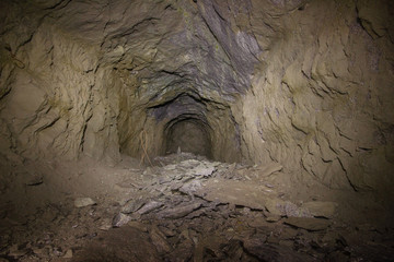 Underground abandoned ore mine shaft tunnel gallery collapsed