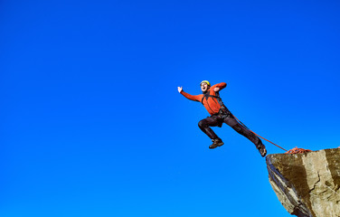 Jump off the cliff with a rope.